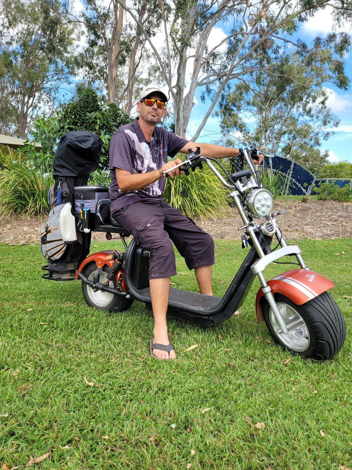 10-inch fat tires on electric golf scooter for sand, mud, and fairway stability with minimal wear