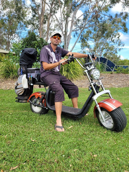 10-inch fat tires on electric golf scooter for sand, mud, and fairway stability with minimal wear
