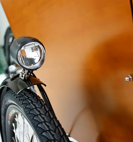 Integrated LED safety lights on electric trike for nighttime urban commutes